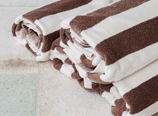 Bath Towels Don't Belong at The Pool, Here's What to Use Instead